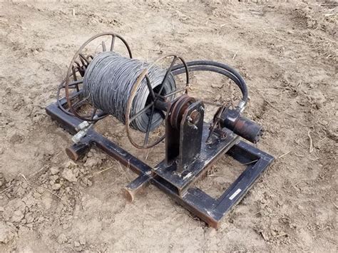 hydraulic skid steer wire winder